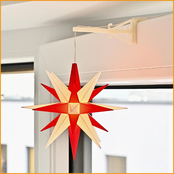 Rot‑weißer Herrnhuter Stern 13 cm am Fensterhalter