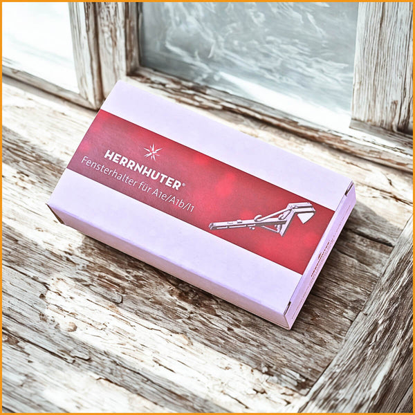 Verpackung „HERRNHUTER Fensterhalter für A1e/A1b/A1/Miniatur“